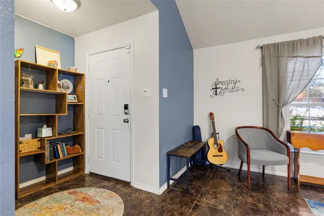 a room with furniture and a window