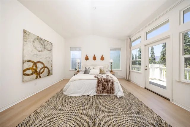 a bed room with a bed and a couch