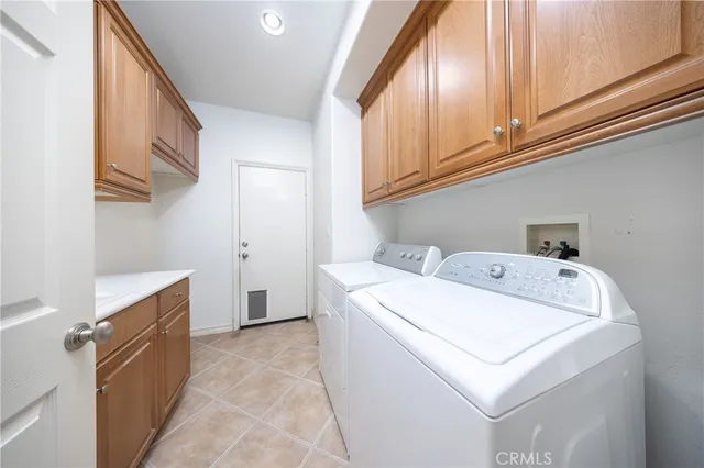a dining room with furniture and a garden