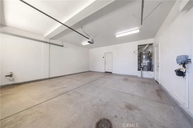an aerial view of a house with yard swimming pool and outdoor seating