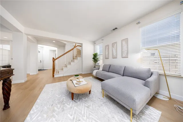 a living room with furniture and a table