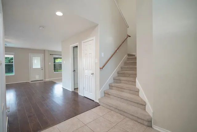 a view of entryway with wooden floor