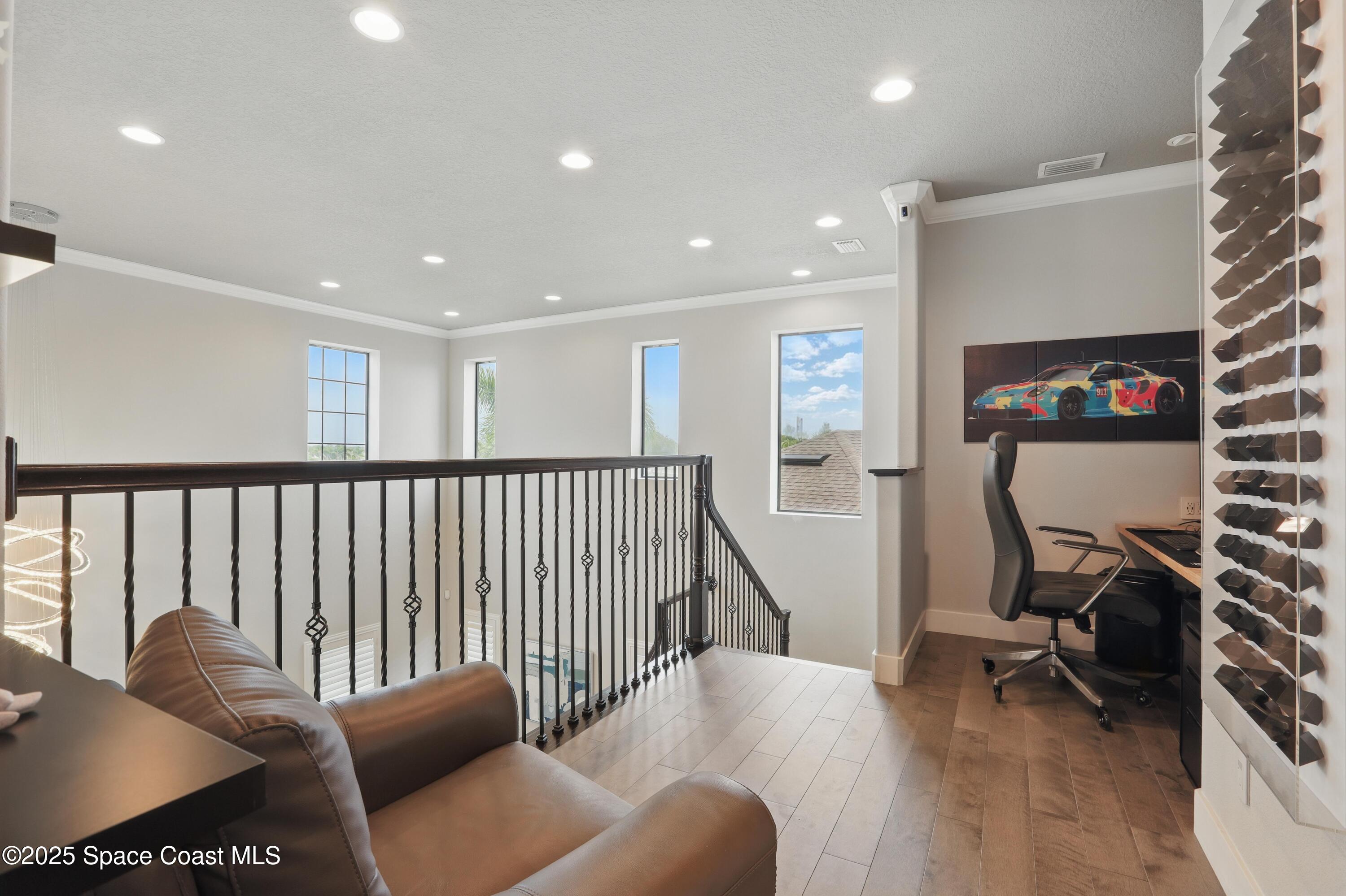 3222 Casterton Drive Melbourne, FL 32940 - Photo 26 of 67 a view of a hallway with workspace and a window