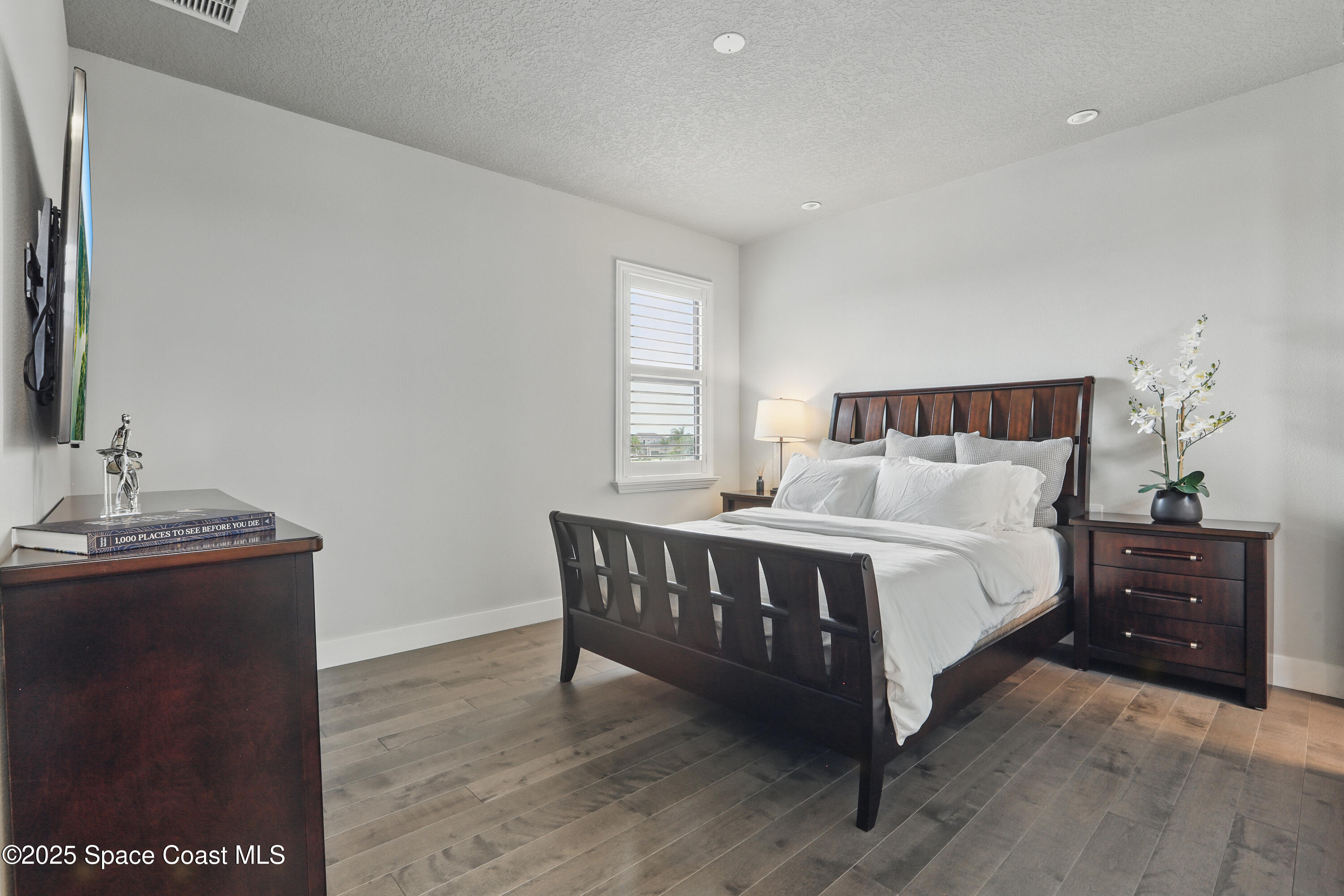 3222 Casterton Drive Melbourne, FL 32940 - Photo 31 of 67 a bedroom with a bed and window