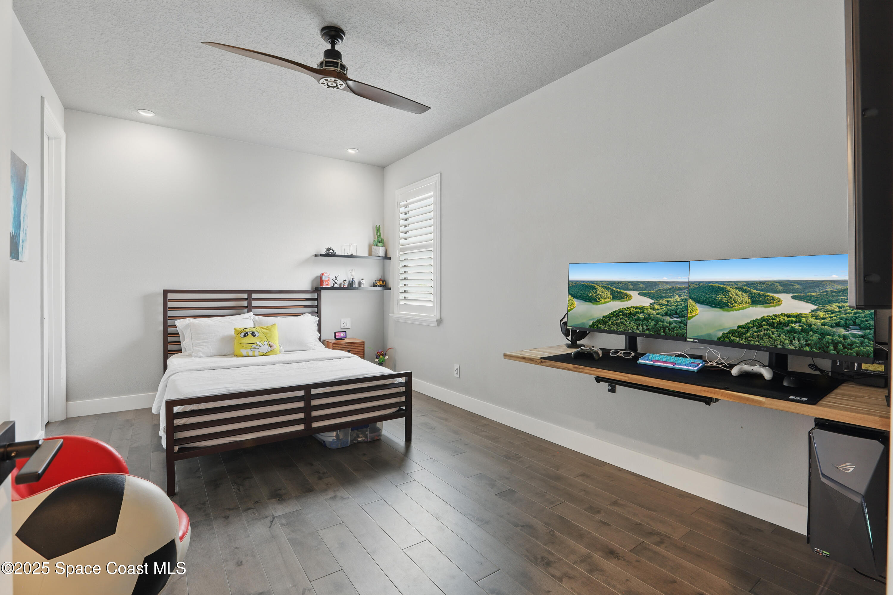 3222 Casterton Drive Melbourne, FL 32940 - Photo 34 of 67 a bedroom with bed and a window