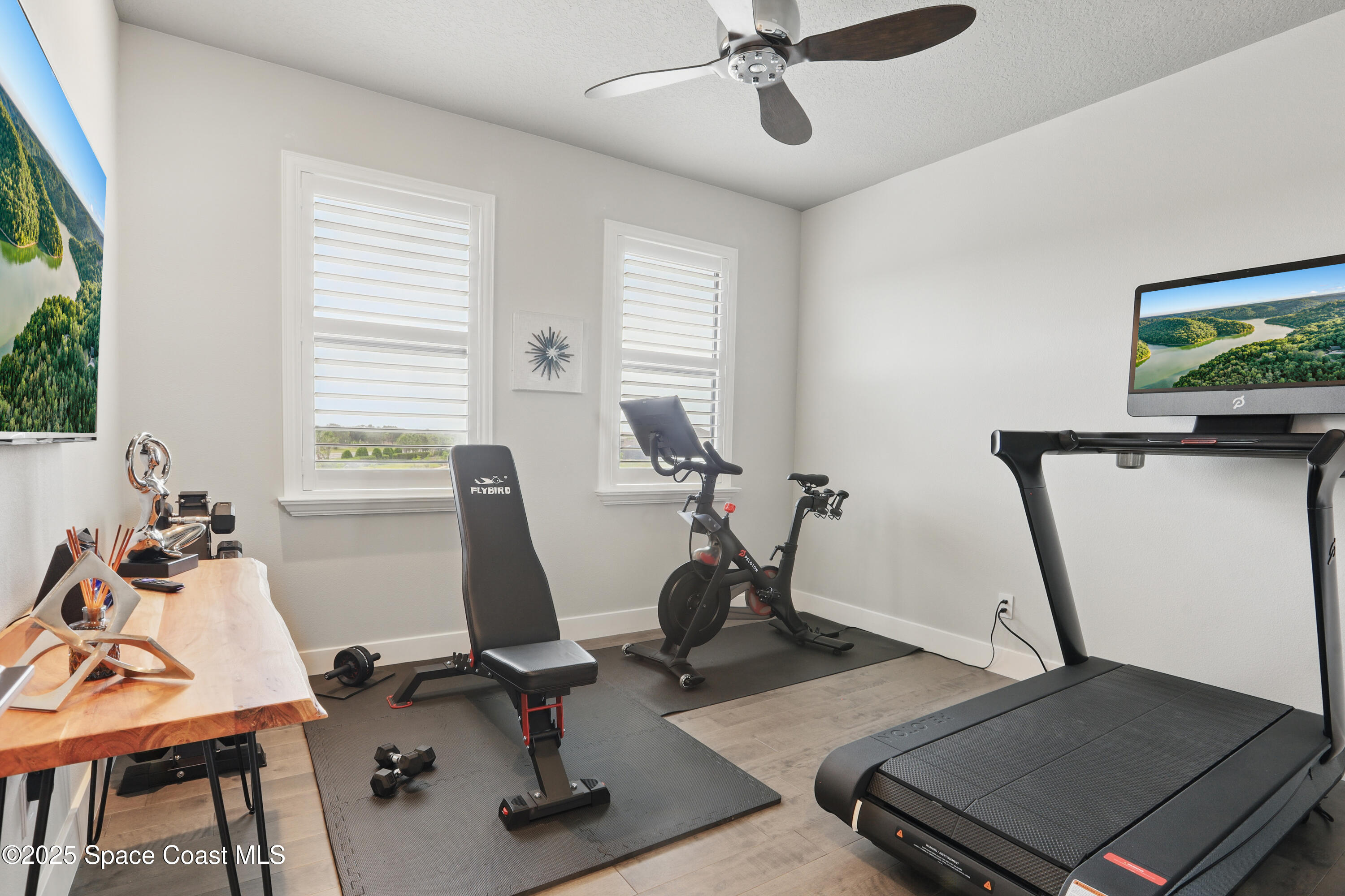 3222 Casterton Drive Melbourne, FL 32940 - Photo 36 of 67 a view of a room with gym equipment