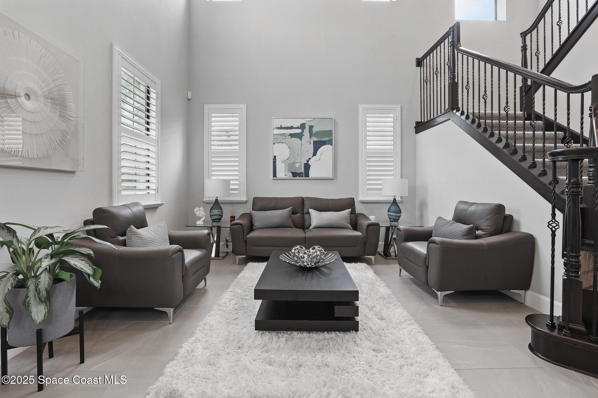 3222 Casterton Drive Melbourne, FL 32940 - Photo 4 of 67 a living room with furniture and a window