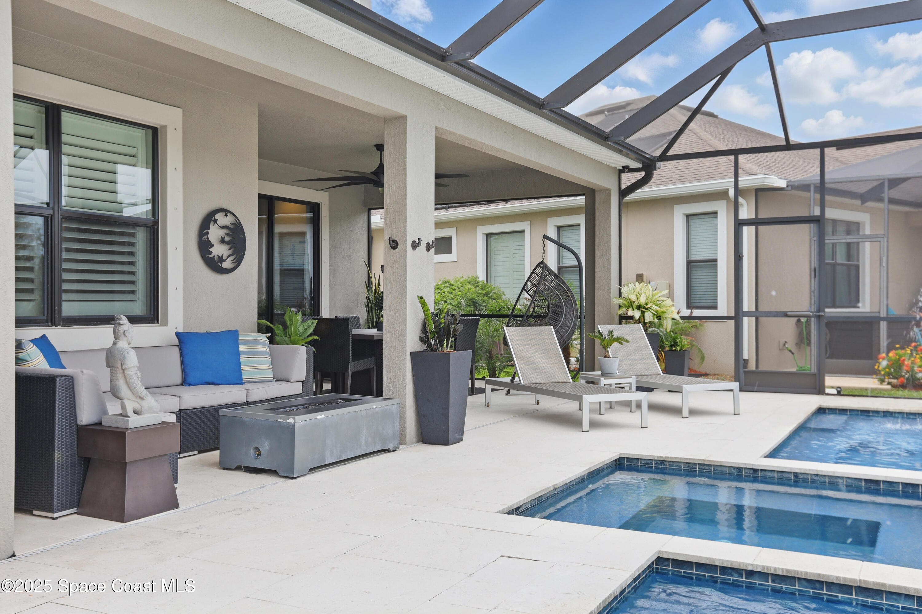 3222 Casterton Drive Melbourne, FL 32940 - Photo 42 of 67 a living room with furniture and a table