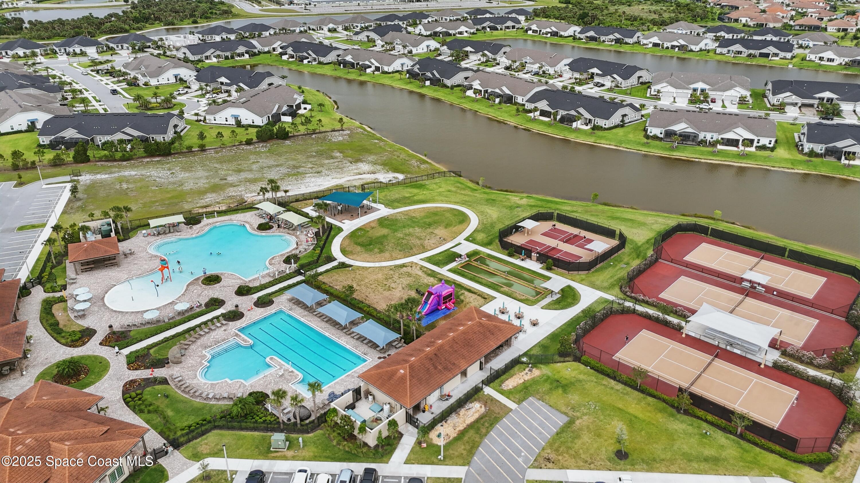 3222 Casterton Drive Melbourne, FL 32940 - Photo 64 of 67 an aerial view of tennis court