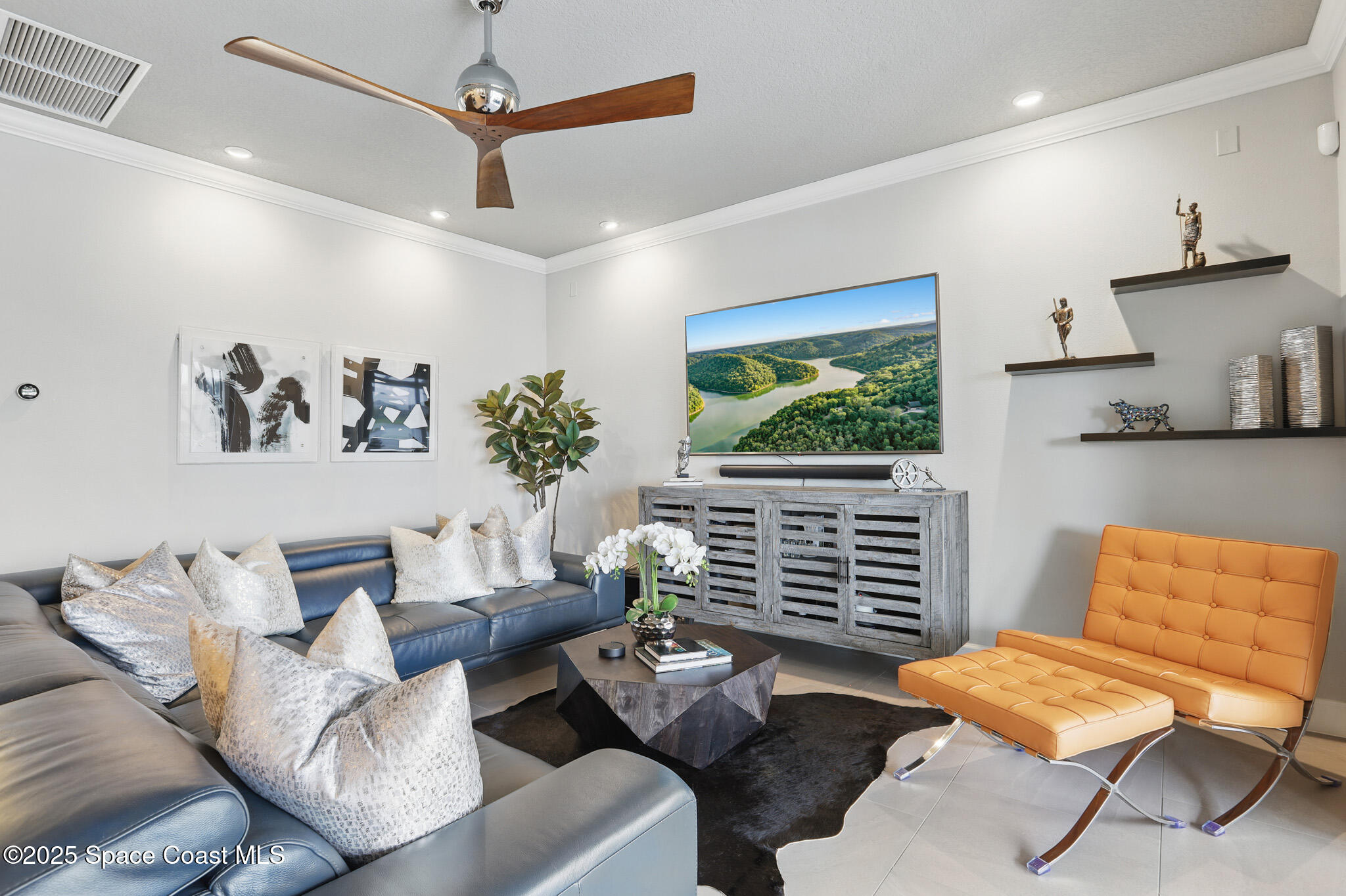 3222 Casterton Drive Melbourne, FL 32940 - Photo 8 of 67 a living room with furniture and a window