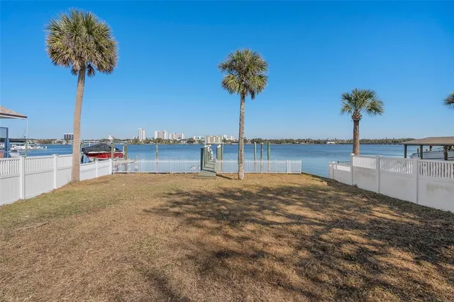 a view of residential houses with outdoor space