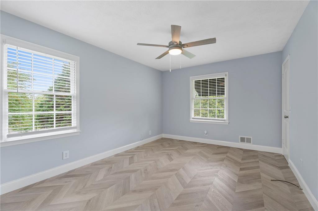 2827 Highway 138 Conyers, GA 30013 - Photo 18 of 32 a view of an empty room with a window