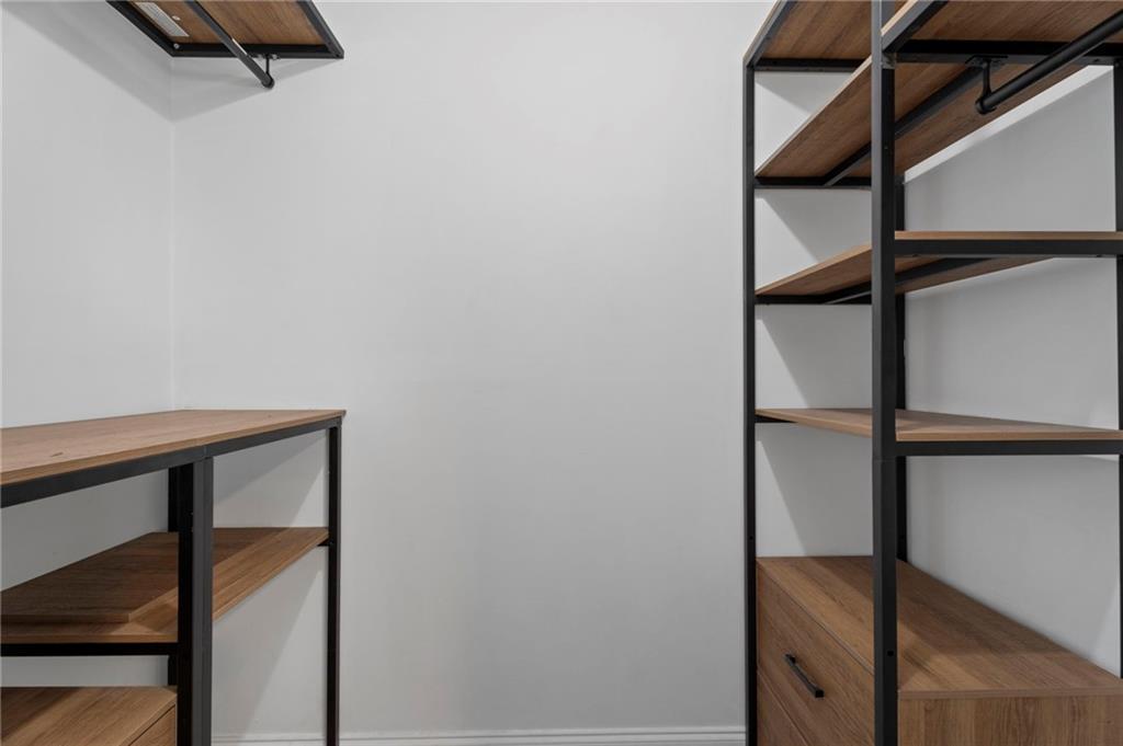 2827 Highway 138 Conyers, GA 30013 - Photo 22 of 32 a view of staircase with wooden floor