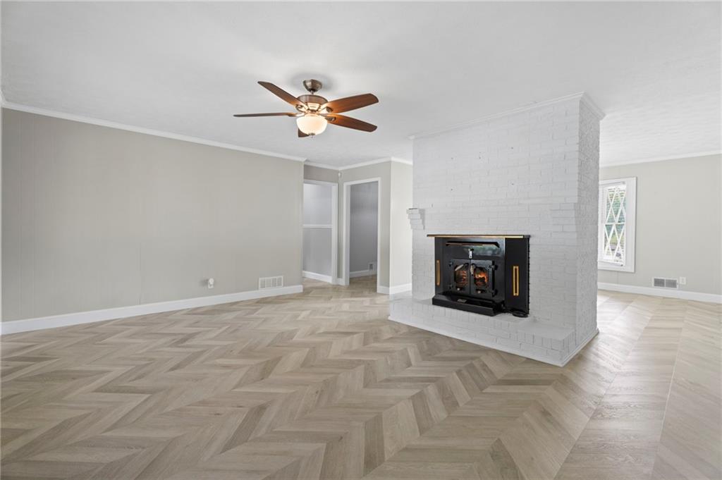 2827 Highway 138 Conyers, GA 30013 - Photo 27 of 32 a view of empty room with a fireplace
