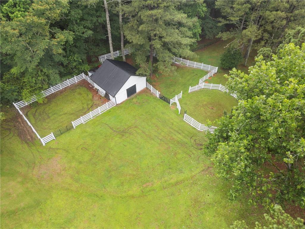 2827 Highway 138 Conyers, GA 30013 - Photo 5 of 32 a view of a house with a yard