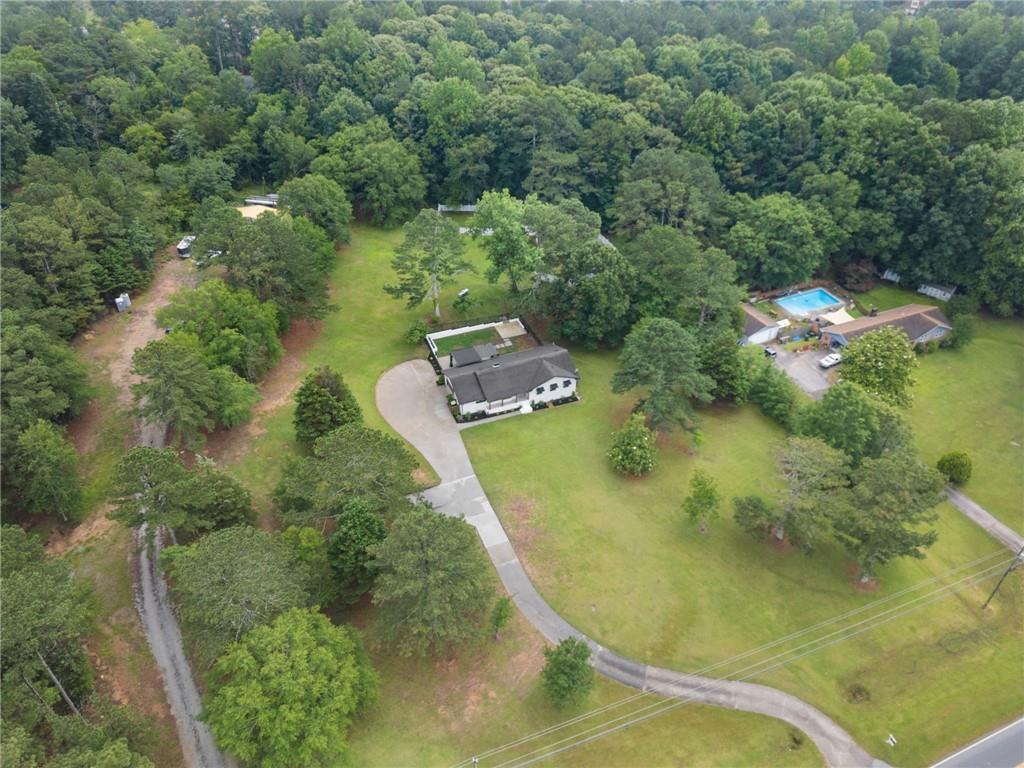 2827 Highway 138 Conyers, GA 30013 - Photo 7 of 32 an aerial view of a house