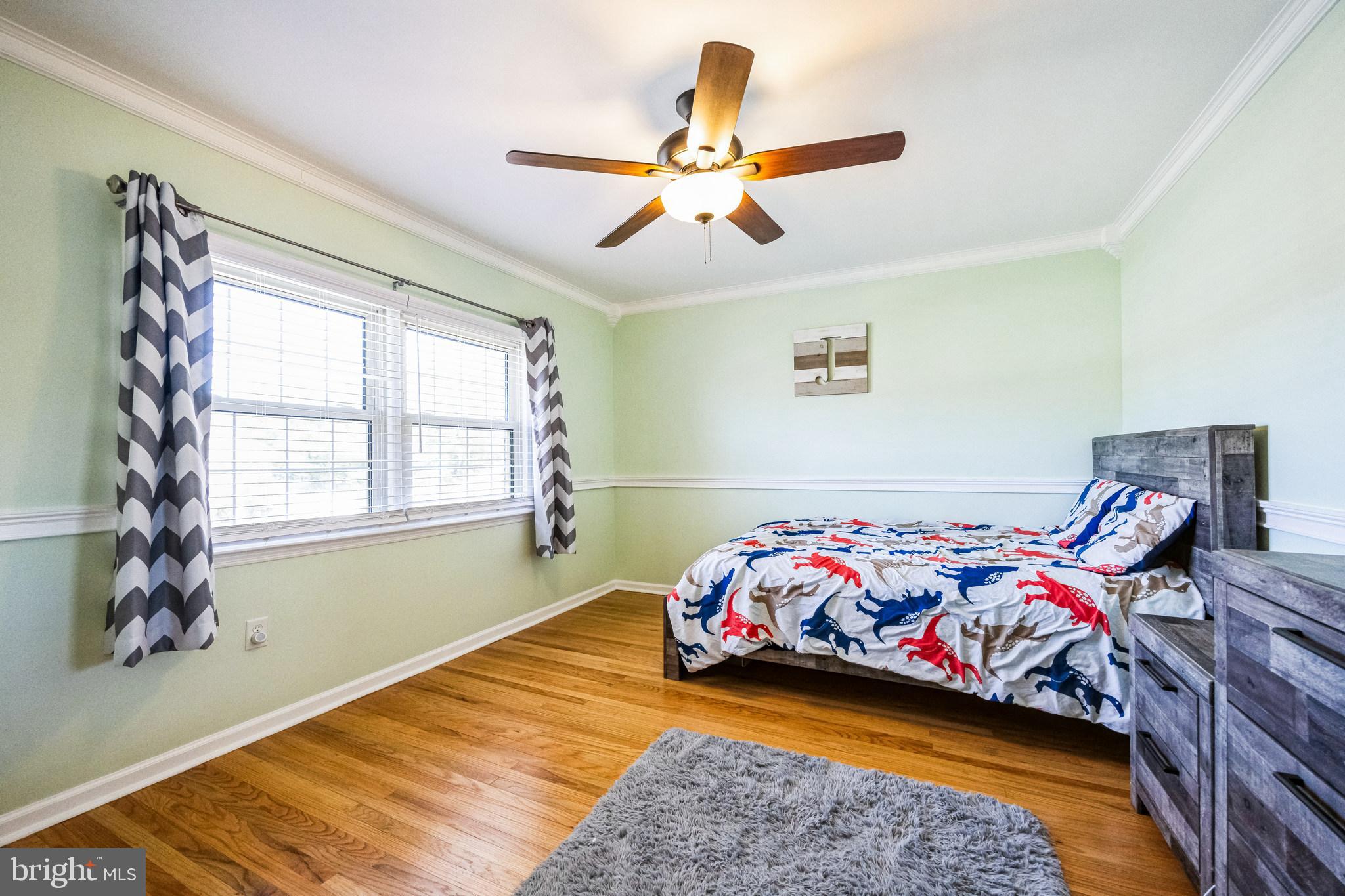 2016 Morris Drive Cherry Hill, NJ 08003 - Photo 16 of 31 a bedroom with bed and a window