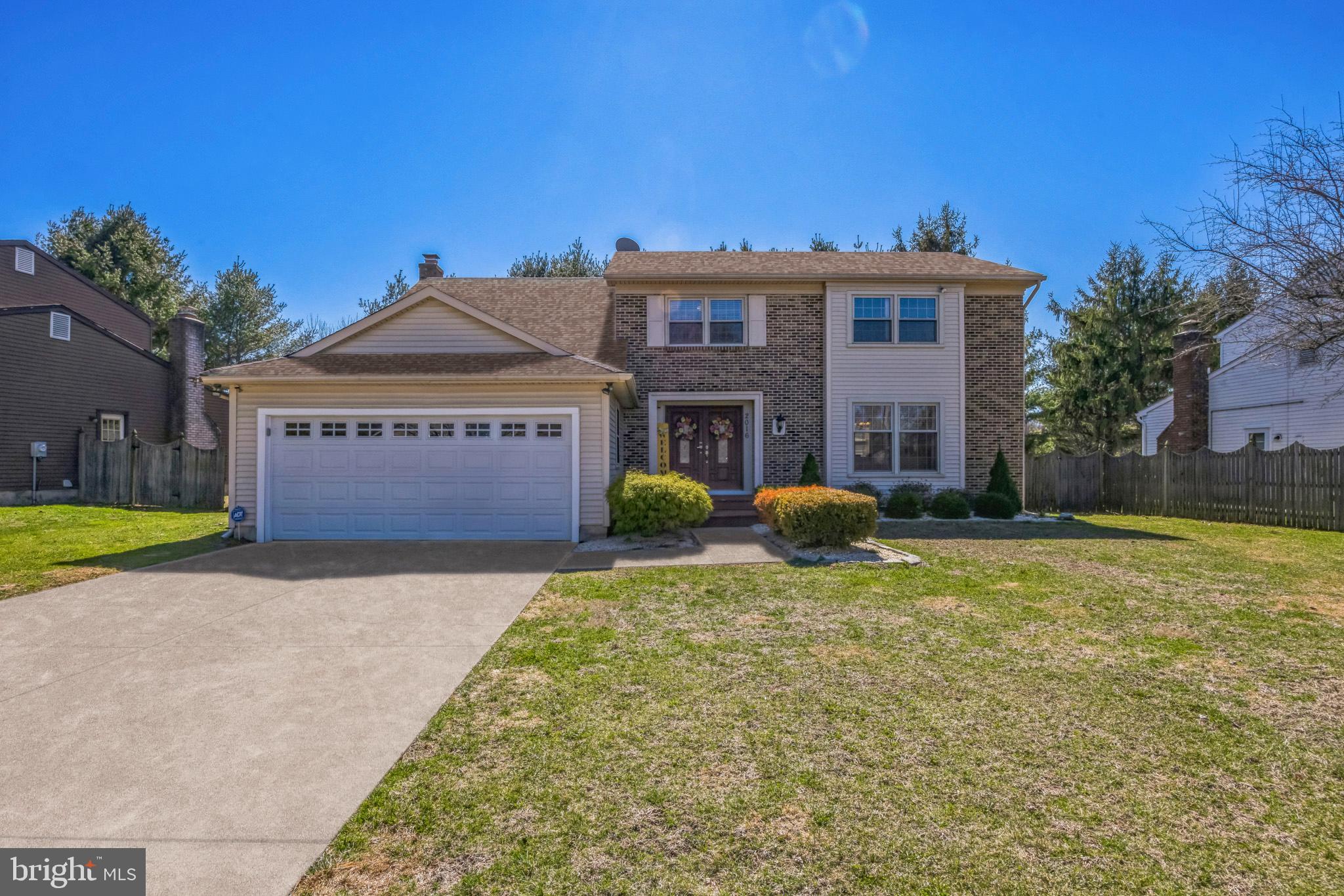 2016 Morris Drive Cherry Hill, NJ 08003 - Photo 2 of 31 a view of a house with a yard and garage