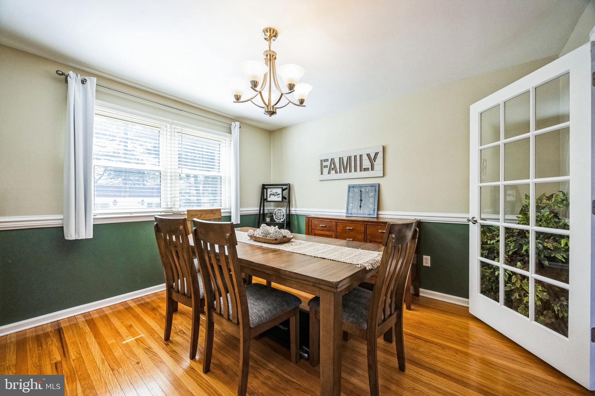 2016 Morris Drive Cherry Hill, NJ 08003 - Photo 6 of 31 a view of a dining room with furniture window and wooden floor