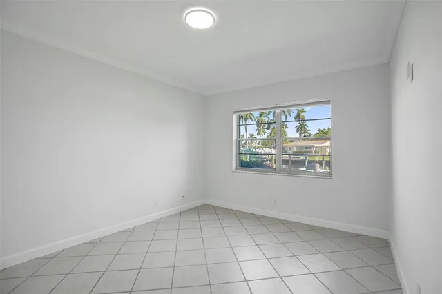 a view of a bathroom from a hallway