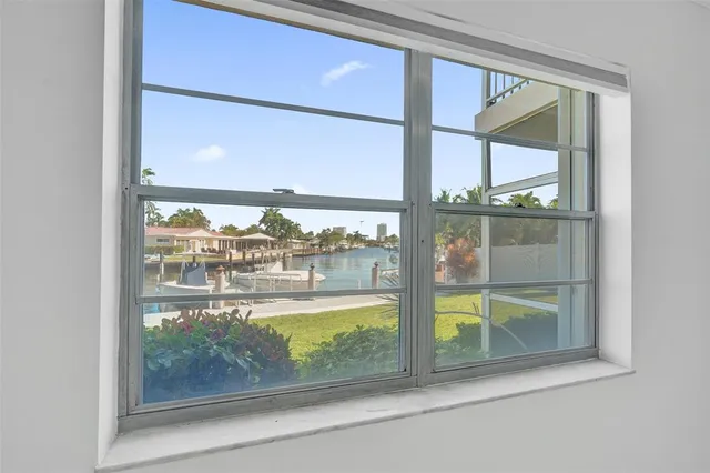 a view of swimming pool from a balcony