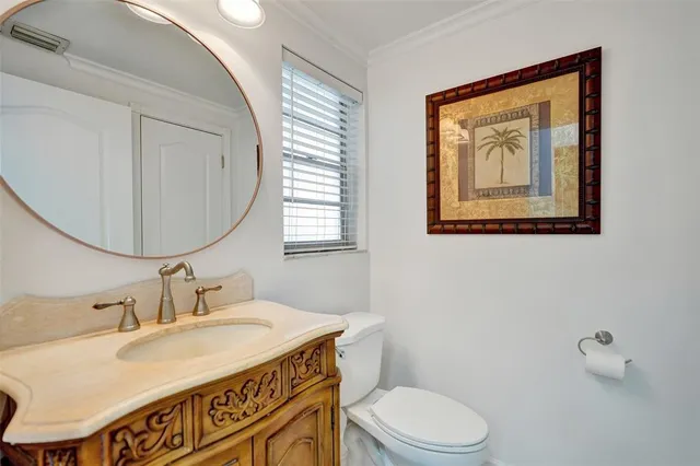a view of a chair and table in the garden