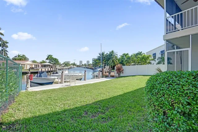 a view of a balcony with potted plants