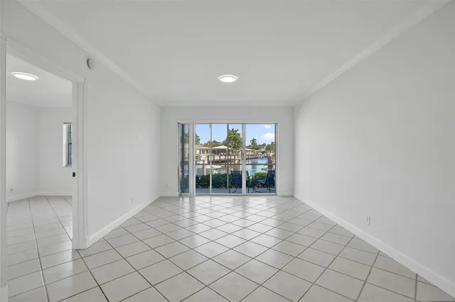 a view of a kitchen with granite countertop a sink
