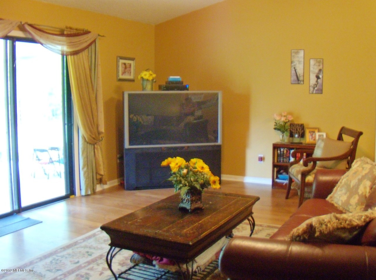 55774 Bear Run Road Callahan, FL 32011 - Photo 3 of 37 a living room with furniture and wooden floor