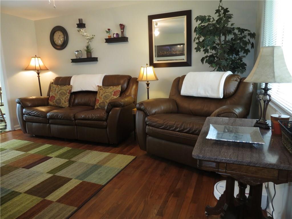 33 Highbury Road Cheswick, PA 15024 - Photo 3 of 17 Another view of the living room and the stunning hardwood floors!