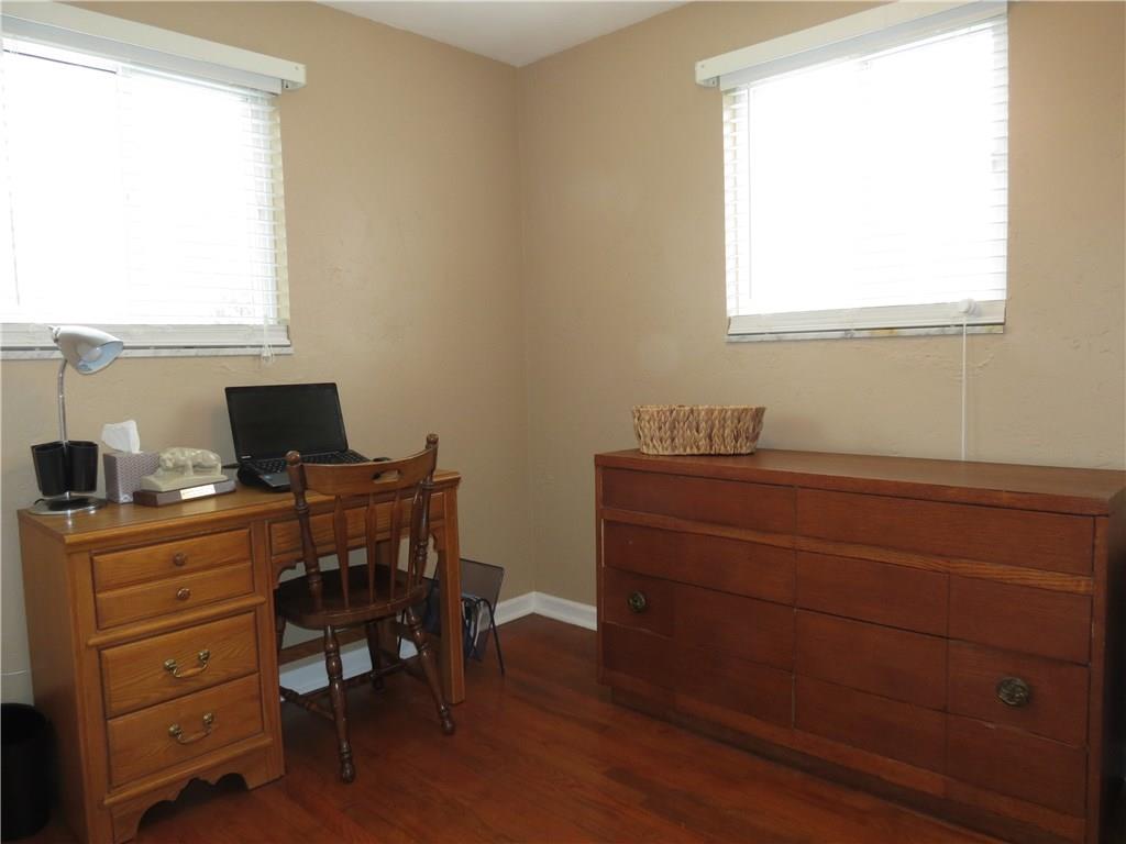 33 Highbury Road Cheswick, PA 15024 - Photo 10 of 17 The third bedroom is also bright and inviting with the large windows and gleaming floors.