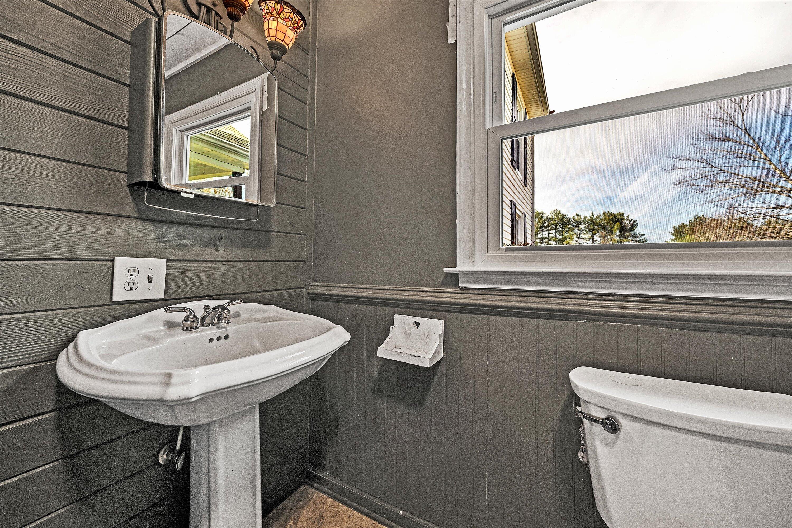 412 Wrays Chapel Road Rocky Mount, VA 24151 - Photo 13 of 25 a bathroom with a sink and a toilet