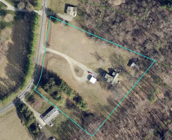 a view of swimming pool with trees in the background