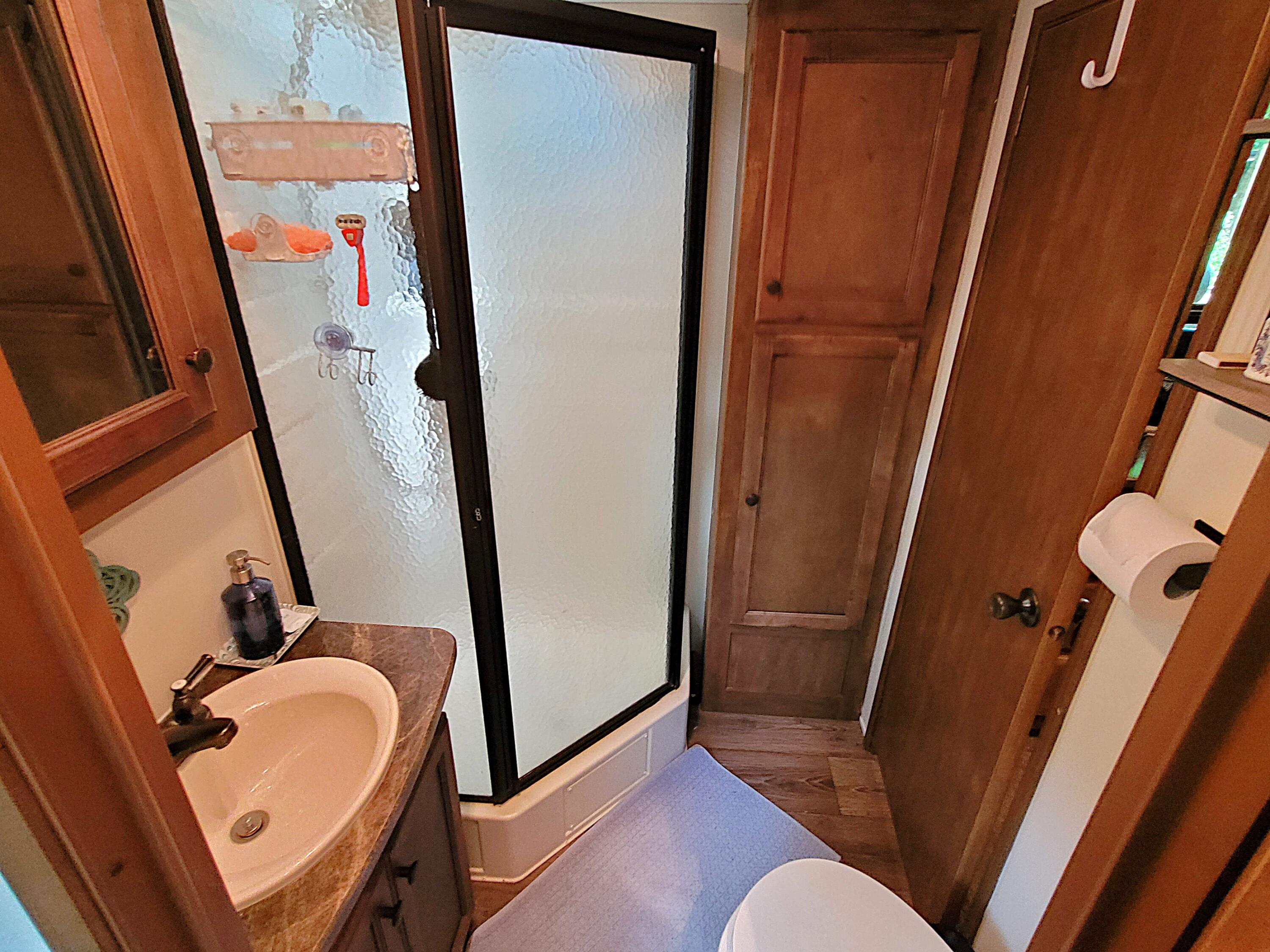 71 South Highland Road, Unit 1 Truro, MA 02666 - Photo 7 of 51 a bathroom with sink and mirror