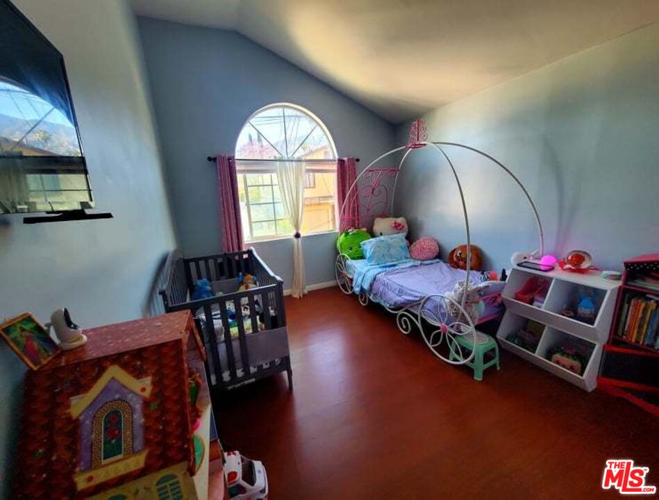 6856 Quinton Lane Tujunga, CA 91042 - Photo 5 of 7 a living room with furniture and a wooden floor