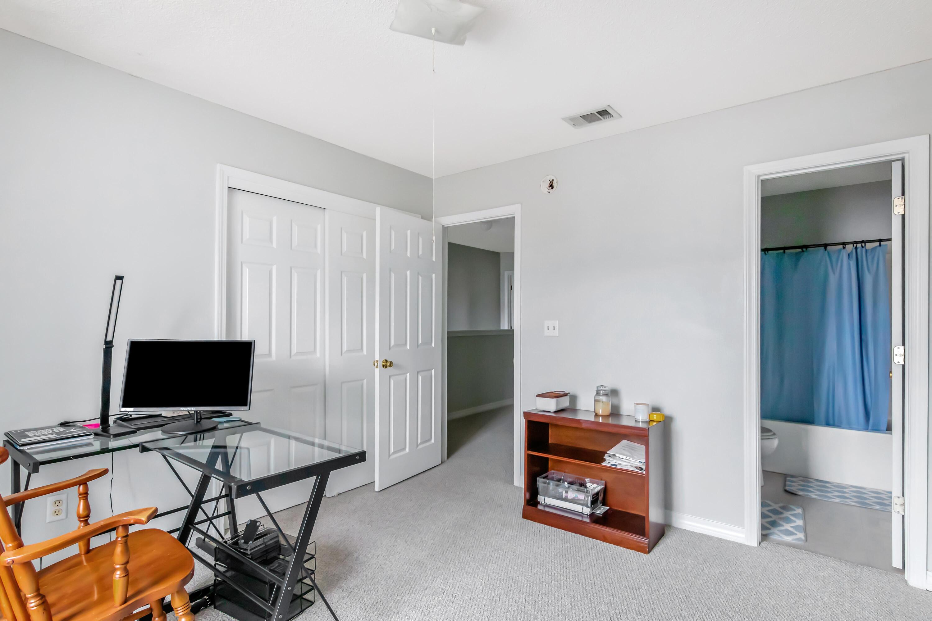 499 Keystone Road Mary Esther, FL 32569 - Photo 20 of 33 a room with furniture and a window