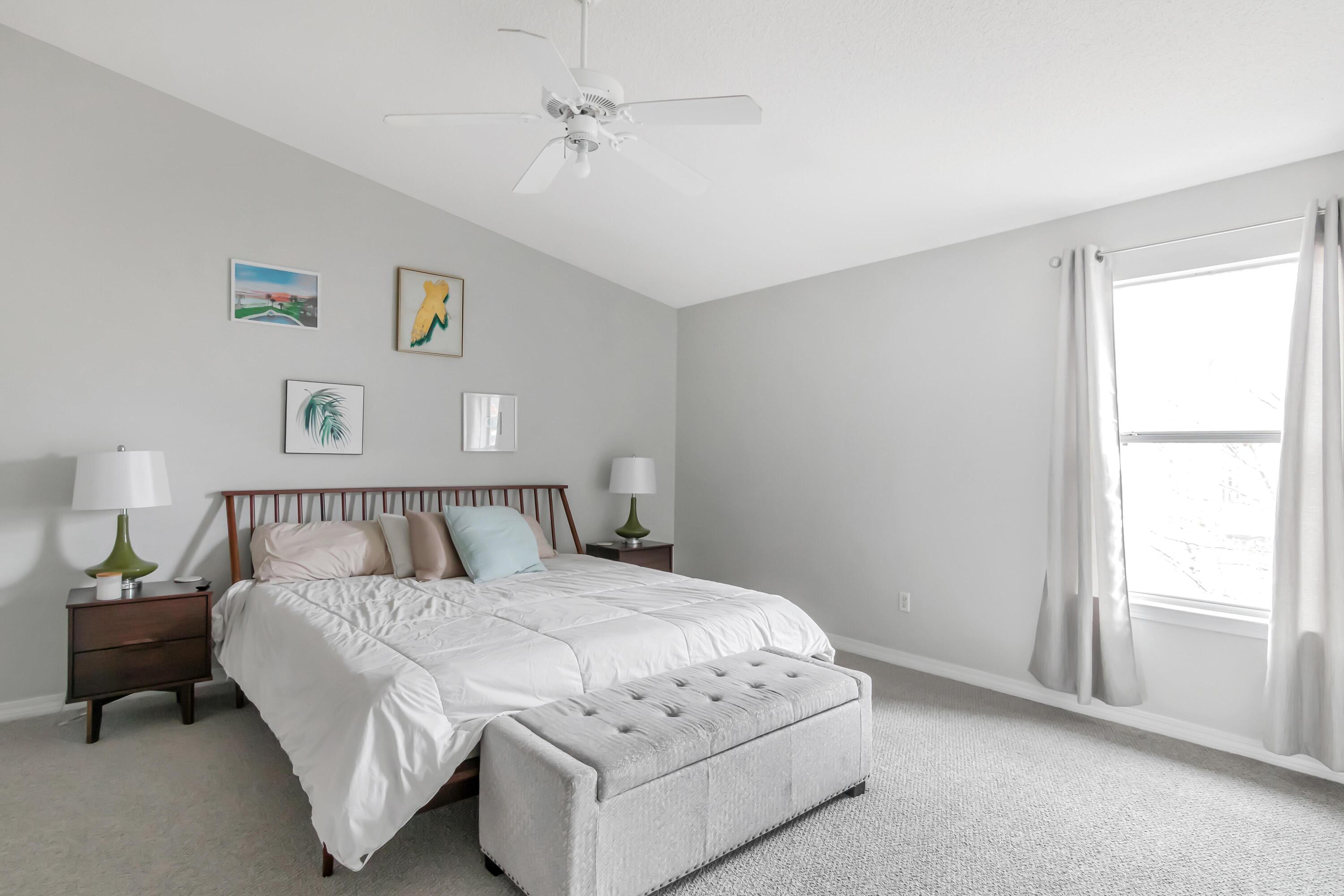 499 Keystone Road Mary Esther, FL 32569 - Photo 23 of 33 a bedroom with a bed and a window