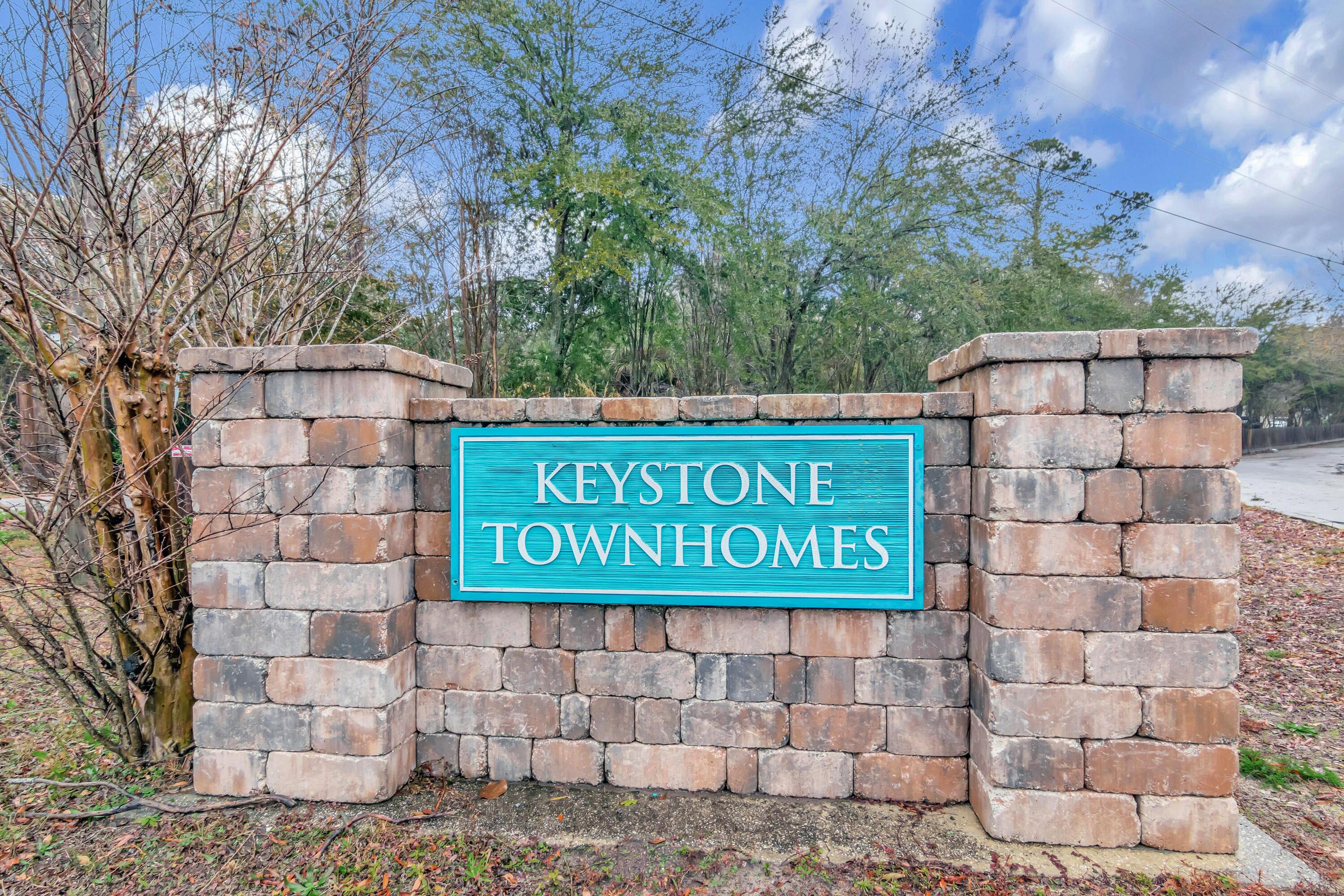 499 Keystone Road Mary Esther, FL 32569 - Photo 33 of 33 a sign on the side of a building