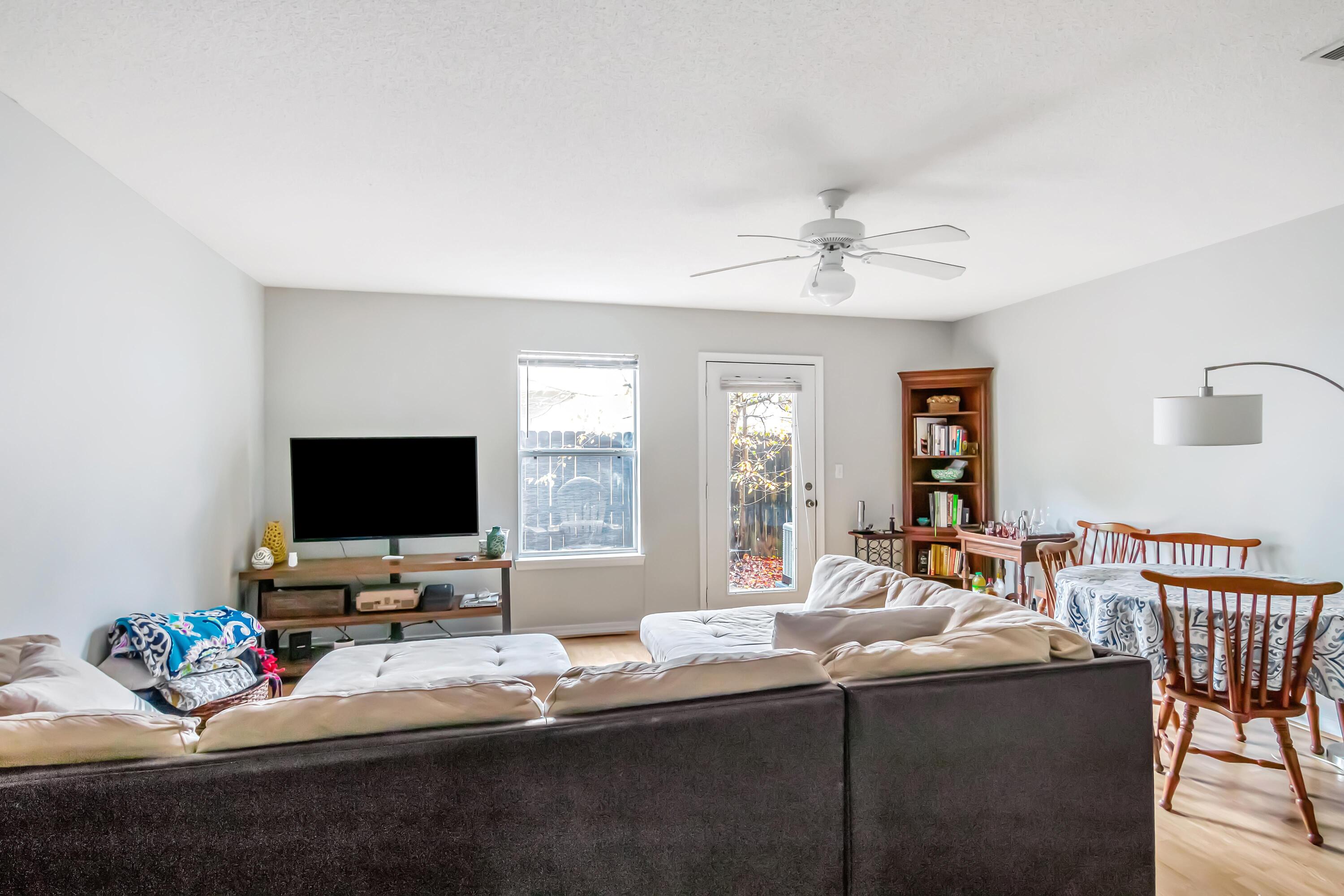 499 Keystone Road Mary Esther, FL 32569 - Photo 6 of 33 a living room with furniture and a flat screen tv