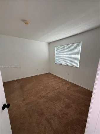 a room with furniture and a fireplace