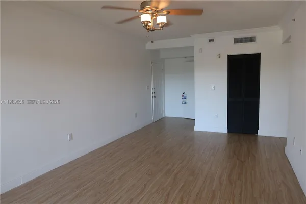 a view of entryway with wooden floor