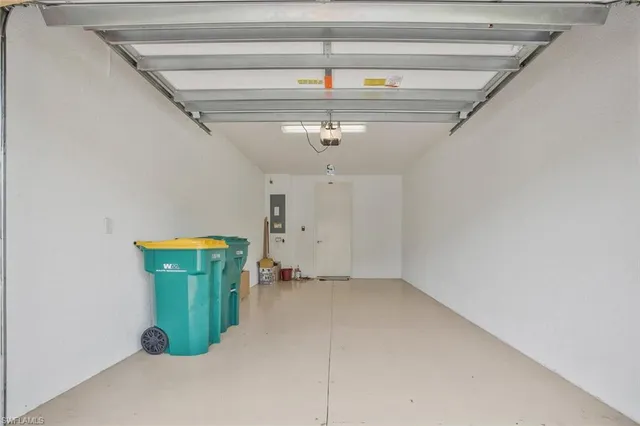 a living room with furniture and a gate