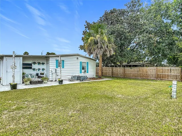 a view of a house with a large window