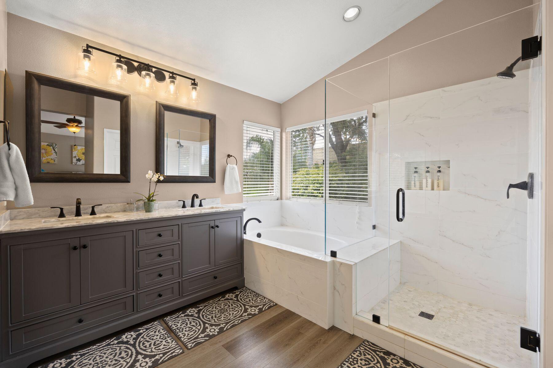 697 Buenos Tiempos Drive Camarillo, CA 93012 - Photo 16 of 29 a spacious bathroom with a tub sink shower and mirror