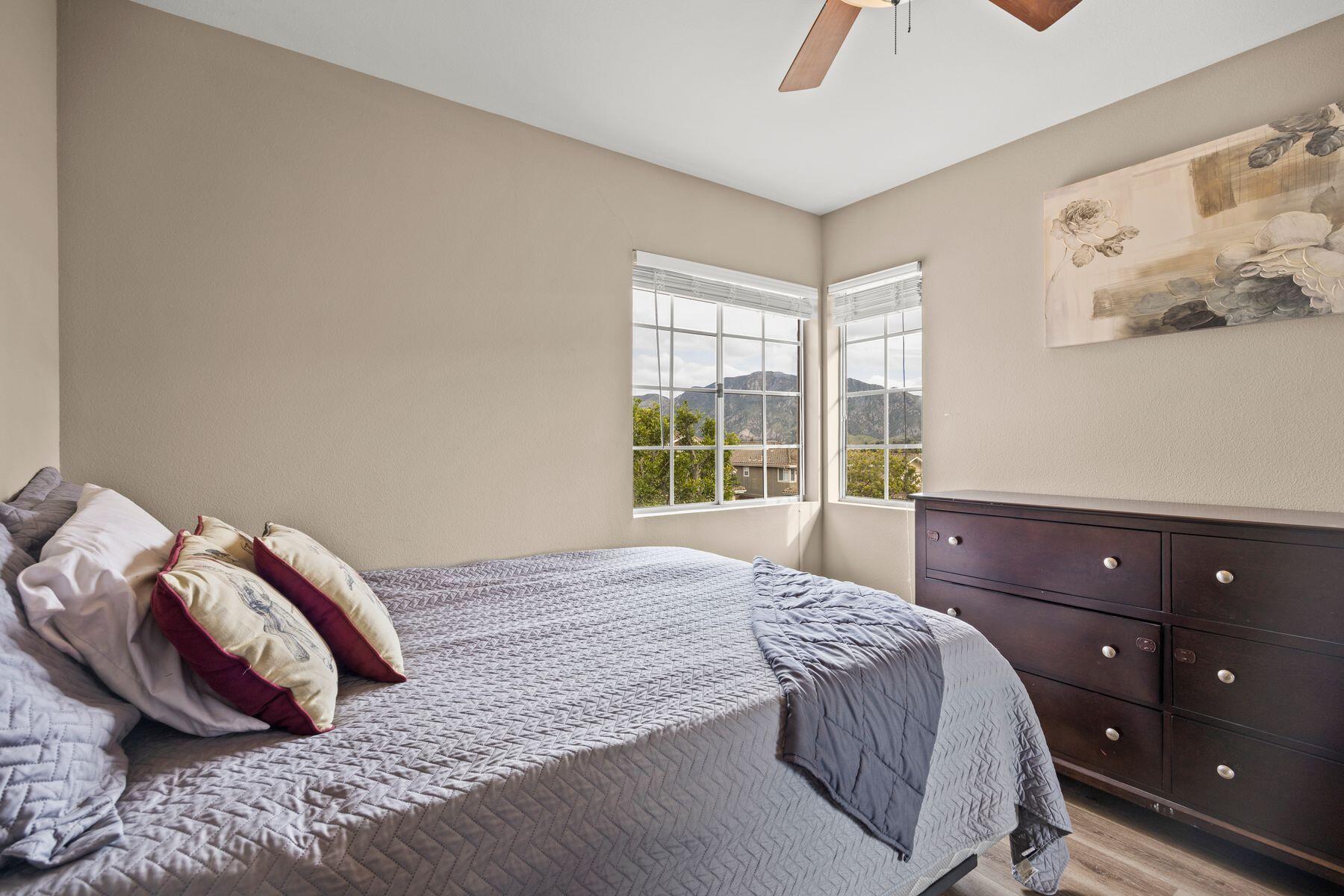 697 Buenos Tiempos Drive Camarillo, CA 93012 - Photo 18 of 29 a bedroom with a bed and a window