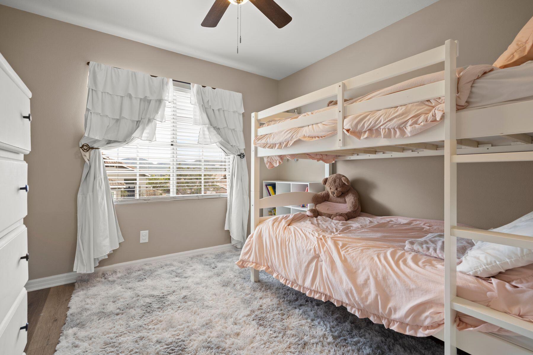 697 Buenos Tiempos Drive Camarillo, CA 93012 - Photo 19 of 29 a bedroom with a bed and a window