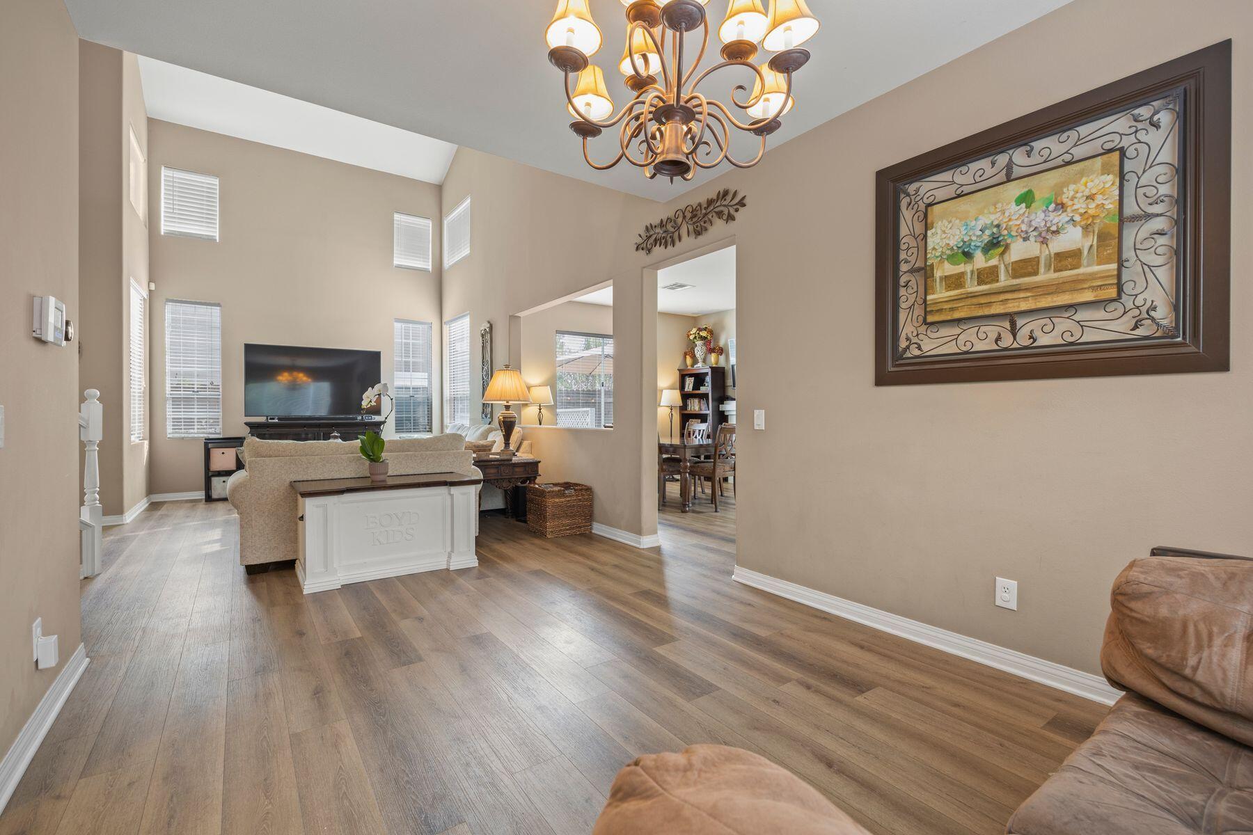 697 Buenos Tiempos Drive Camarillo, CA 93012 - Photo 8 of 29 a living room with furniture and a flat screen tv