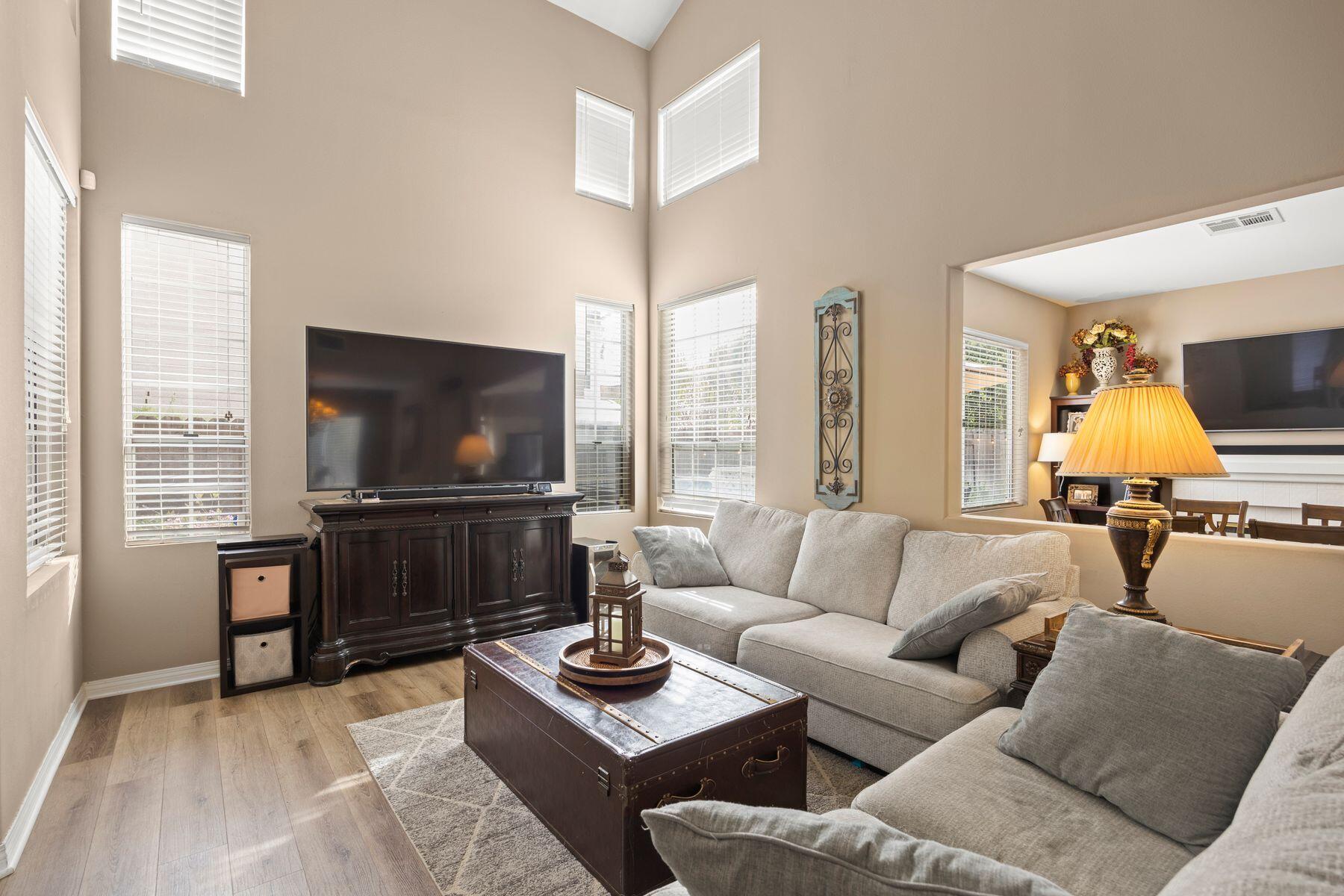697 Buenos Tiempos Drive Camarillo, CA 93012 - Photo 10 of 29 a living room with furniture and a flat screen tv