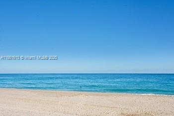 3212 Northeast 8th Court, Unit 12 Pompano Beach, FL 33062 - Photo 9 of 17 a view of empty room with wooden floor