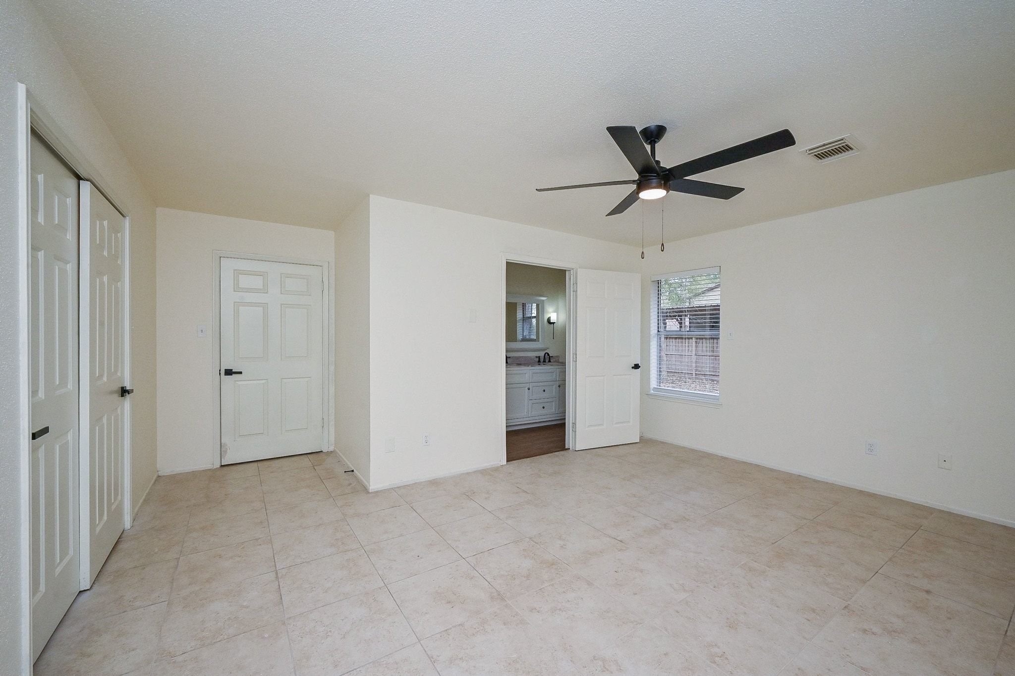 17831 Magnolia Lane New Caney, TX 77357 - Photo 15 of 27 This room is equipped with a huge ceiling fan! This room also has an en-suite bath and huge gorgeous windows!